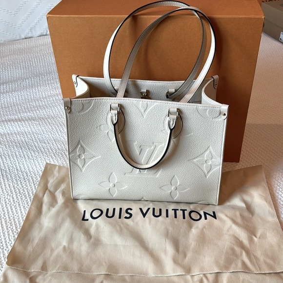 Louis Vuitton Handbags - Louis Vuitton OnTheGo MM Cream Tote w/ box and dust bag